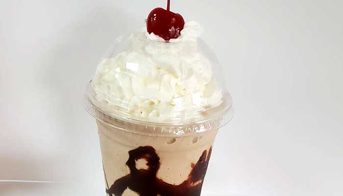 Chocolate shake dessert with cherry on top served at Colorado's best restaurant South Philly Cheese Steaks