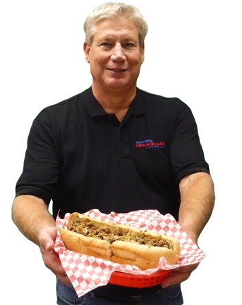 South Philly Cheese Steaks best Colorado restaurant franchise founder John holding an authentic Philly style cheesesteak